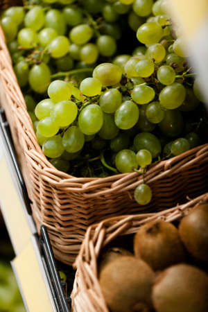 Close up of grapes and kiwis. Concept of healthy food