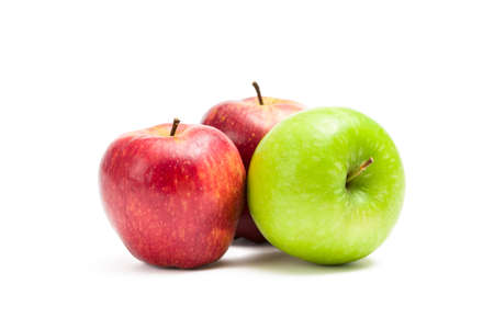 Close up of red and green apples, isolated on white. Concept of healthy eating and dieting lifestyleの写真素材