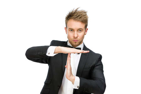 Half-length portrait of manager time out gesturing, isolated on whiteの写真素材