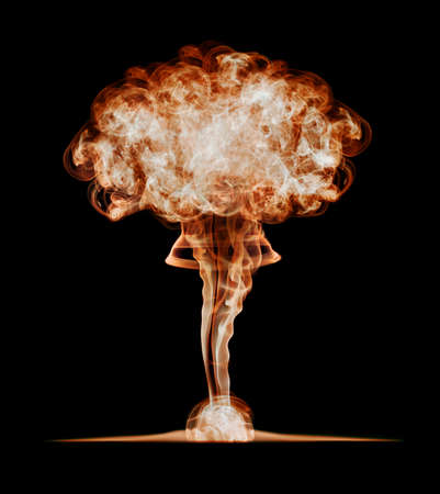 Nuclear explosion, isolated on black background. Danger of nuclear energy.の写真素材