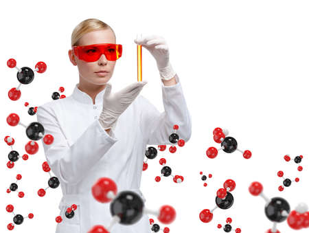 Young woman doctor in glasses hands vial on chemical combination background. Research concept.