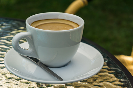 Cup of coffee on the tableの写真素材