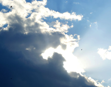 beautiful clouds, sun and skyの写真素材