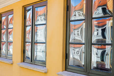 Distorted Reflection in slugs glass windows