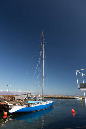 Blue Sailboat in the harbor of Aeroeskoebingのeditorial素材