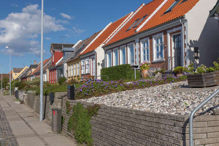 A series of small houses in the harbor of Rudkbing, Langeland, Denmarkのeditorial素材