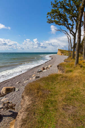 Stone beach with cliffs on the southern tip of the island of Langeland, Denmarkの写真素材