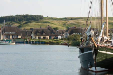 Boats and houses at the port of Gager (Ruegen)の写真素材