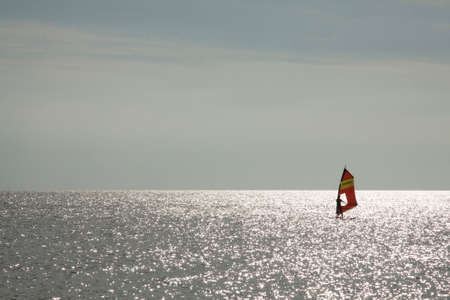Surfer in back light on the Baltic Seaのeditorial素材