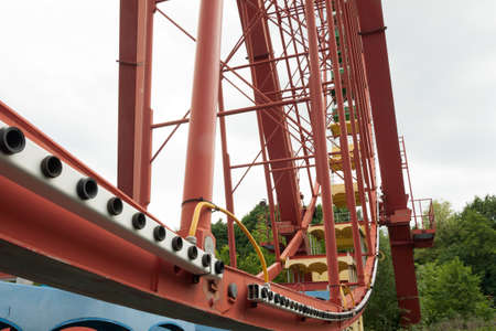Gondolas of a derelict Ferris wheel with Graffiti