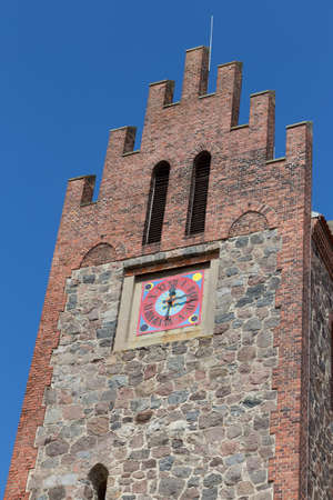 Tower of a church with a large clock face