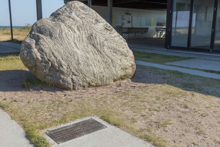 Large boulder marks the southernmost point of Denmark near Gedserの写真素材