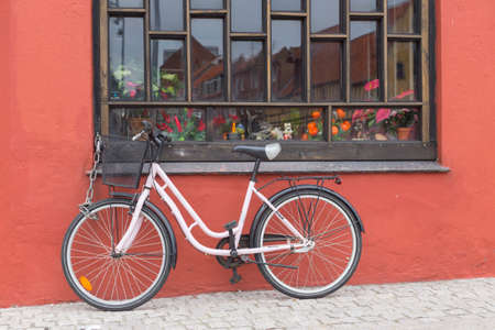 Chained ladies bike at a shop in Nykobingの写真素材