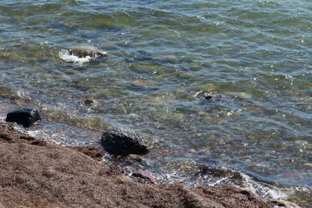 Three boulders on the beach of Skelby Falster Denmarkの写真素材