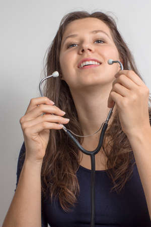 Portrait of a woman with a stethoscope.の写真素材