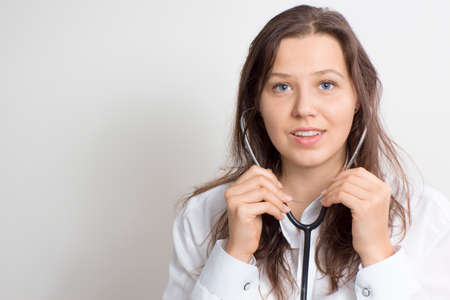 Portrait of a woman with a stethoscopeの写真素材