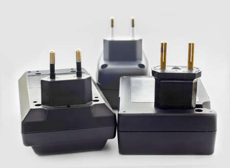 Close view of three battery chargers
