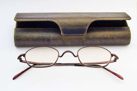 Eyeglasses and eyeglasses case in a white backgroundの写真素材