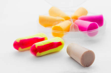 Close view of anti bruits protection mousse in a white backgroundの写真素材