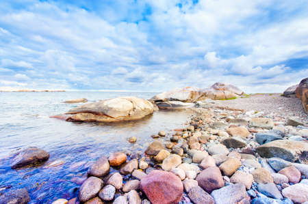 Colorful rocky shore in Norway  near the seaの写真素材