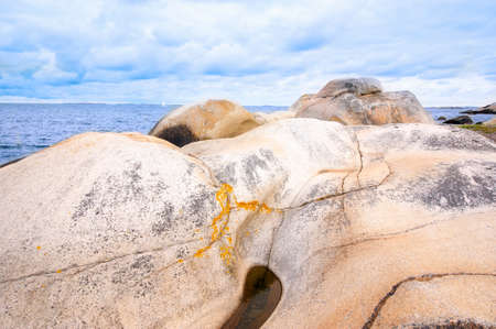 Colorful rocky shore in Norway  near the seaの写真素材
