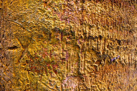 Weathered old insulation foam on an a outdoor wall for background