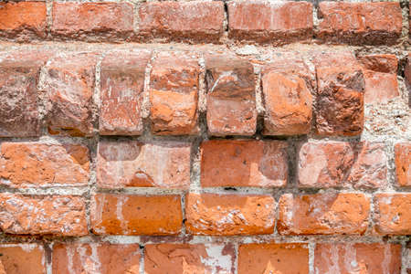 Close view of an old red brick wallの写真素材