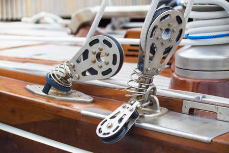 Close view of ropes fastening mechanisms in a yacht