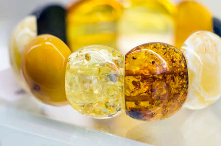 Amber bracelet in  a blurry backgroundの写真素材