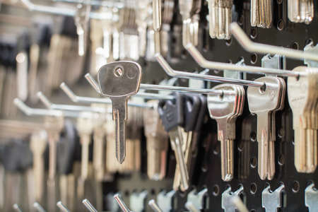 Blank key  on a special wall in a workshop