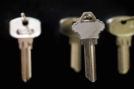 Blank key  on a special wall in a workshopの写真素材