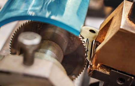 Close view of key copying machine with key.の写真素材