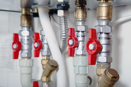 Close view of heating system's plastic  ball valves の写真素材