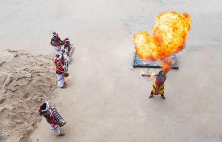 Sri lankan man perform traditional fire dance circa  Fire dance is popular tourist attraction on luxury resorts of Sri Lankaの写真素材