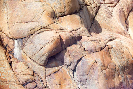 Close up of cracked rock fragment with textureの写真素材