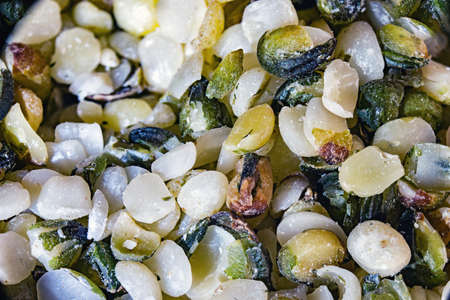 Healthy edible hemp seeds with a coarse grind in macroの写真素材