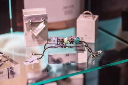 Close up of various bracelets and other jewelryの写真素材