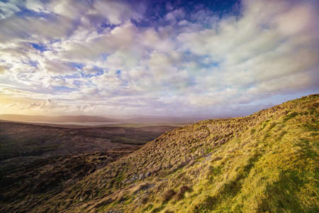 Panoramic landscape with sunny sunset in a county Kerry. Ireland.の写真素材
