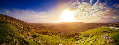 Panoramic hazy sunset in a county Kerry. Ireland.の写真素材