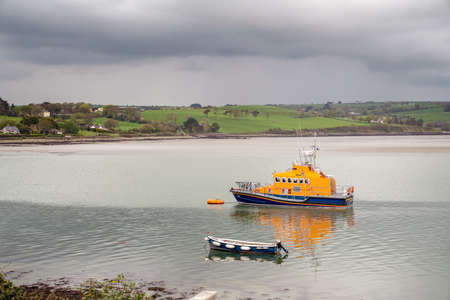 Lifeboats in a river   Arigideen delta at low tide. County Cork, Ireland.