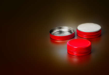 Small metallic jar with essential oils balm. Close up.の写真素材