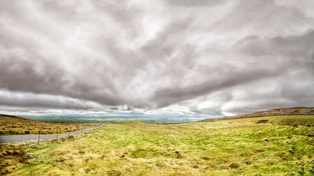Beautiful panoramic landscape wtih dramatic clouds in the south west of Ireland. Spring.