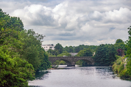 Wellington Bride on river Lee in Cork on cloudy summer day. Ireland.の写真素材