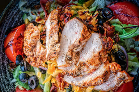 Vegetable salad with chicken. Close up, top view.の写真素材