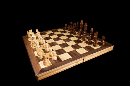 chess a good game for the brain and strategy. wooden chessborad. black vs white. conflict peopleの写真素材