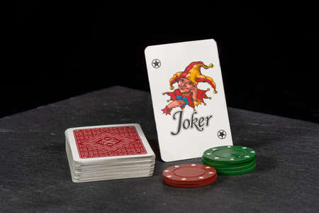 game night playing whit friends, poker game money on the game. win or lose. you have the hand.