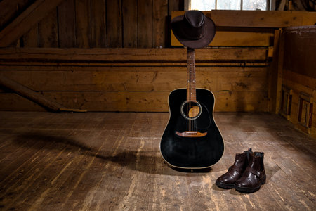 Guiatr for country music a hat and boots all you need to country dance.の写真素材