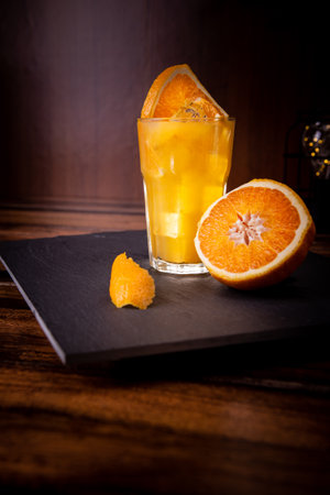 drink is ready for the weekend. a cold drink waiting for you after a hard week. you have everything needed in one drink. you have ice you have soda you have alcohol and some fruit. perfect weekend.の写真素材