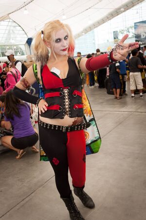 San Diego Comic Con July 12-15, 2012. The world?s largest convention of its kind featuring media, movies, comic books, anime, entertainment, video games and more! Photo of cute blonde dressed up as Harlequin taken on July 12, 2012.のeditorial素材