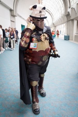 San Diego Comic Con July 12-15, 2012. The worlds largest convention of its kind featuring media, movies, comic books, anime, entertainment, video games and more! Photo of Steampunk man dressed in heavy armor taken on July 12th, 2012.のeditorial素材